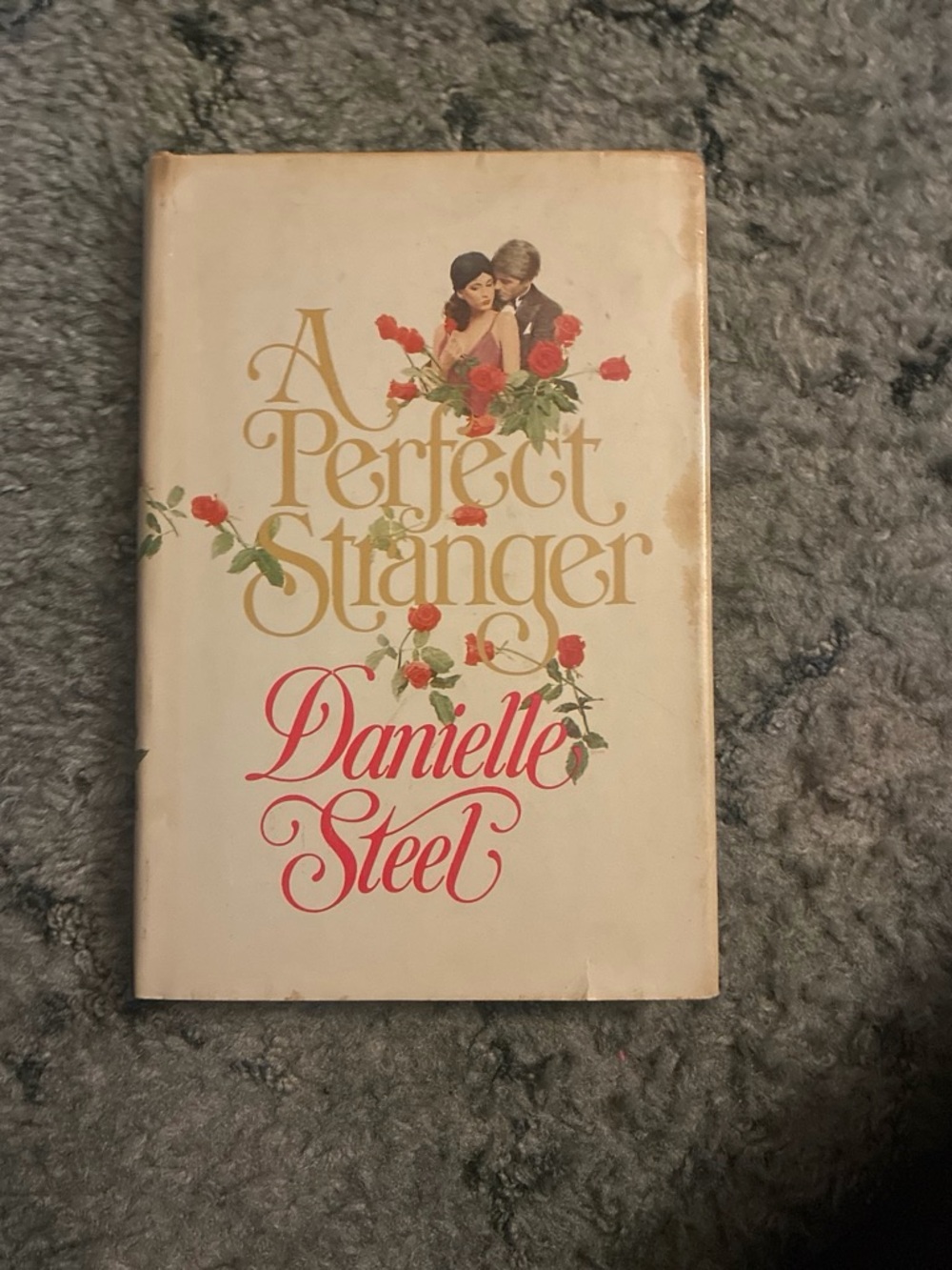 'A Perfect Stranger' book - Cream and Red